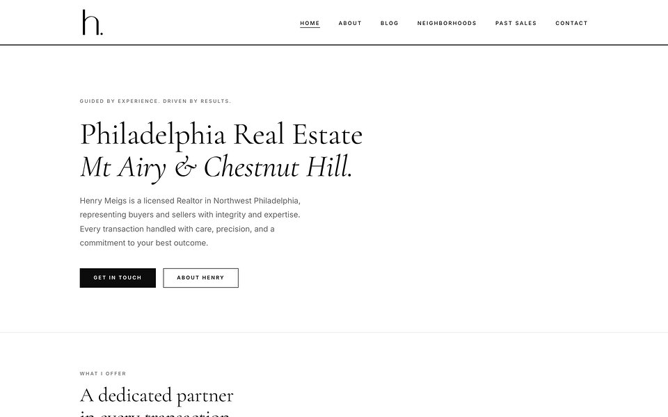The henrymeigs.com homepage: an editorial Philadelphia real estate site built by Letter Box Digital, with serif headlines and a clean navigation.